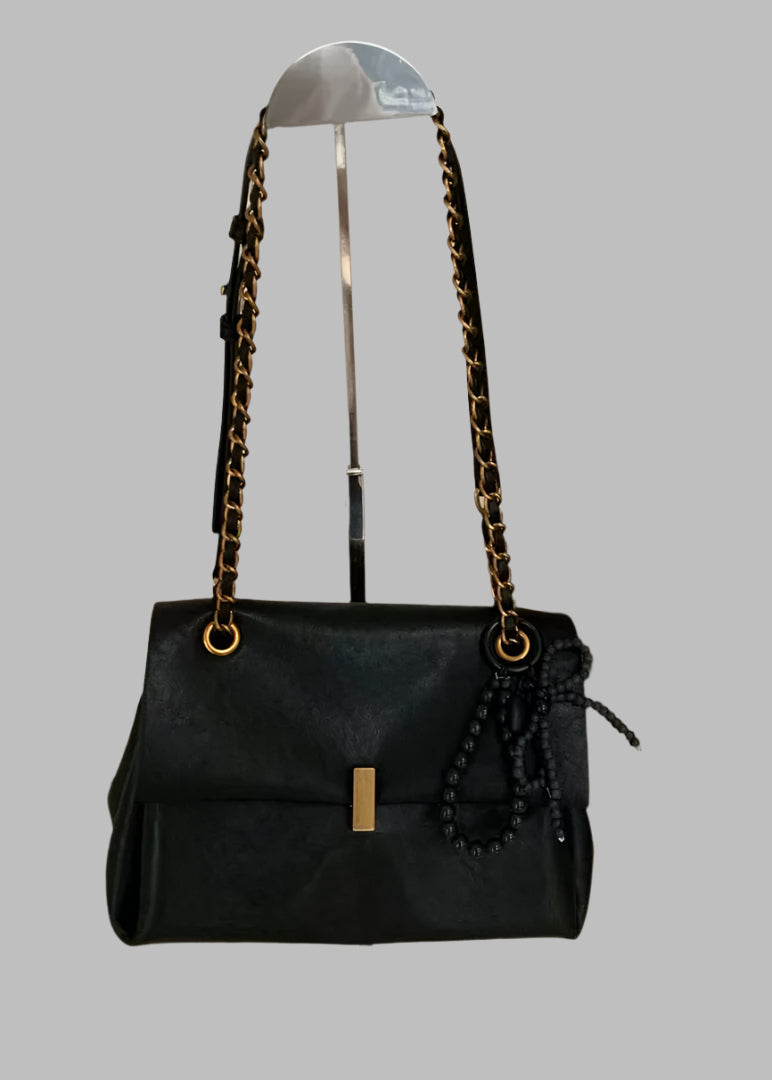 Bead detail clutch bag